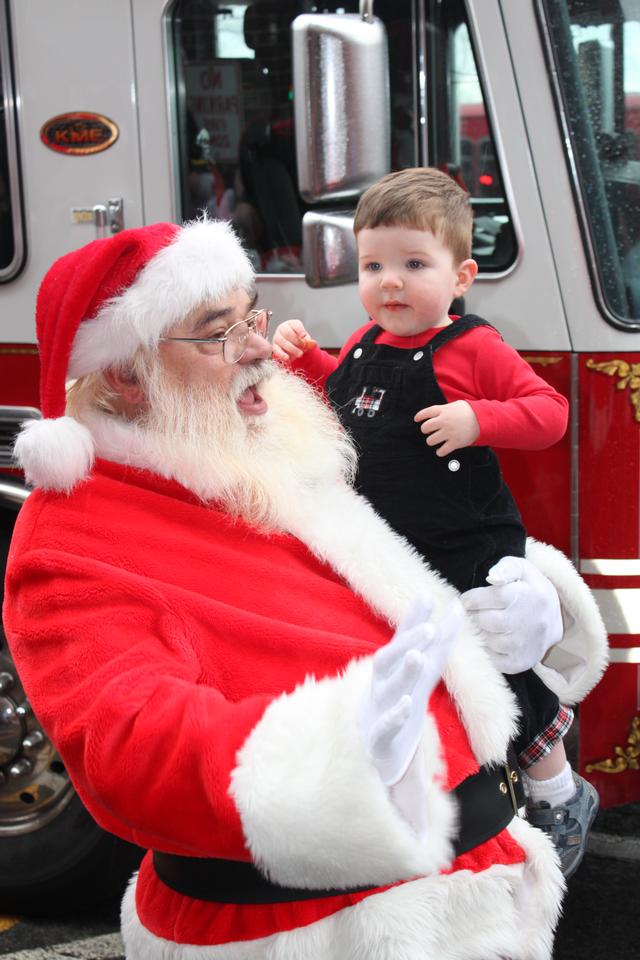 Children's Christmas Party at 8-100. 12-9-2012. Santa pays a visit . Photo by Vincent P. Tuzzolino